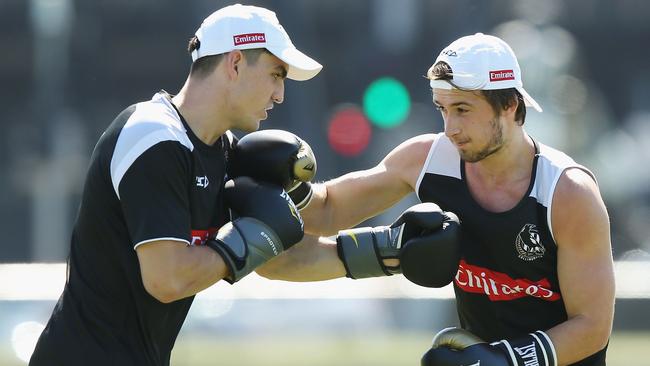 Brayden Maynard (left) likes slugging it out to some house music, while Tom Phillips works by his own clock. Pic: Getty Images