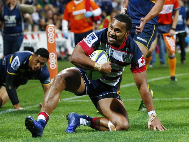 Super Rugby - Melbourne Rebels V Brumbies at AAMI Park , Rebels Sefa Naivalu crosses for a try as Nigel Ah Wong arrives too late. . 13th May 2016. Picture: Colleen Petch.