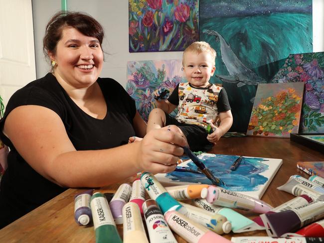 Jessica van Genderen, 30, painting at home with son Teun, 1. Picture: Liam Kidston