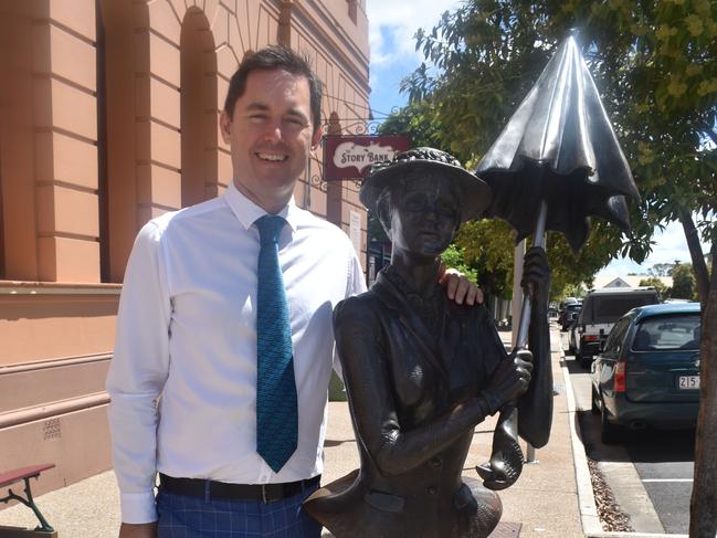 Fraser Coast Mayor George Seymour outside Maryborough Story Bank with the Mary Poppins statue. Photo: Stuart Fast