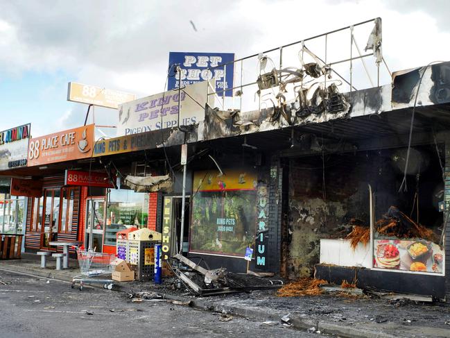 Police suspect the neighbouring dessert store was firebombed. Picture: Luis Enrique Ascui