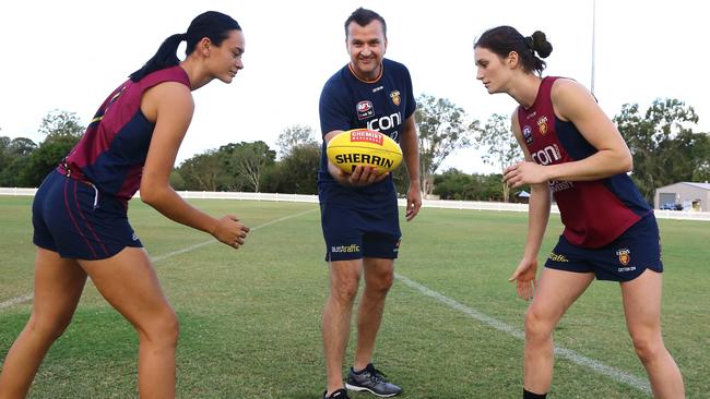 AFLW Lions Jesse Wardlaw and Jessy Keeffe have been learning ruck techniques from triple premiership player Clark Keating.