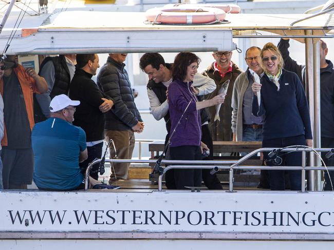 10/02/21 Georgie Crozier (right) and Melinda Bath shows off ther catch as their charter boat arrives at the Westernport Marina in Hastings after spending the morning aboard a fishing during a Victorian LNP conference in the Mornington Peninsula. Aaron Francis/The Australian