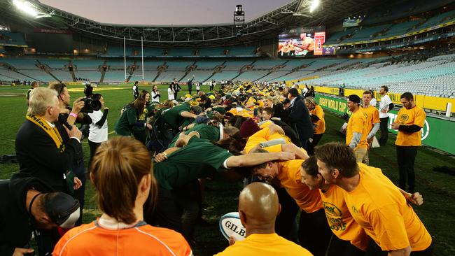 George Gregan feeds the world’s largest scrum at ANZ Stadium.