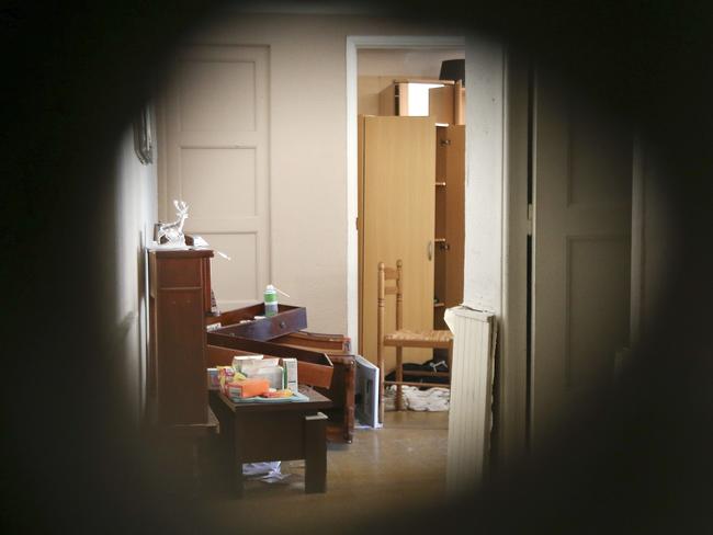 The apartment of Mohamed Lahouaiej Bouhlel is photographed through a hole in the wall made by police, in Nice, southern France. Picture: AP