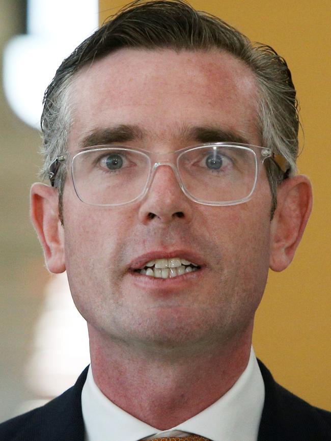 NSW Premier Dominic Perrottet addresses the media at Sydney's International Airport. Picture: Lisa Maree Williams/Getty Images