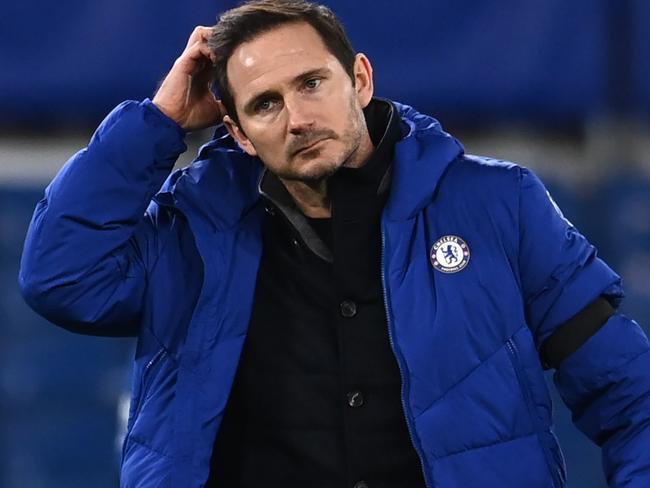 Chelsea's English head coach Frank Lampard reacts to their defeat on the pitch after the English Premier League football match between Chelsea and Manchester City at Stamford Bridge in London on January 3, 2021. - Manchester City won the game 3-1. (Photo by Andy Rain / POOL / AFP) / RESTRICTED TO EDITORIAL USE. No use with unauthorized audio, video, data, fixture lists, club/league logos or 'live' services. Online in-match use limited to 120 images. An additional 40 images may be used in extra time. No video emulation. Social media in-match use limited to 120 images. An additional 40 images may be used in extra time. No use in betting publications, games or single club/league/player publications. /