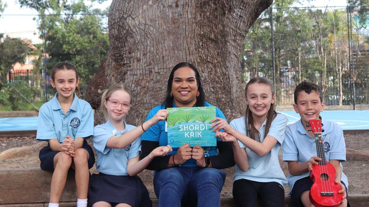 ILF Publishing Projects Editor Cindy Manfong with children from Rozelle Public School in Sydney who have signed up for this year’s Busking for Change. Photo credit: ILF Supplied