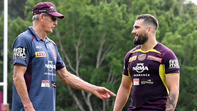 Coach Wayne Bennett speaks with Jack Bird during a Brisbane Broncos training session at Red Hill.