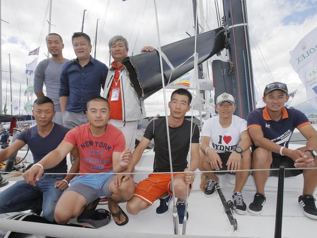 The crew at the end of last year’s race in Hobart with the broken boom.