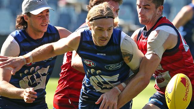 Tom Stewart with eyes for the ball at Cats training. Picture: Alison Wynd