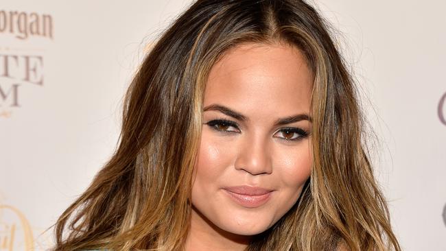 MIAMI BEACH, FL - FEBRUARY 19: Model Chrissy Teigen attends Club SI Swimsuit at LIV Nightclub hosted by Sports Illustrated at Fontainebleau Miami on February 19, 2014 in Miami Beach, Florida. (Photo by Frazer Harrison/Getty Images for Sports Illustrated)