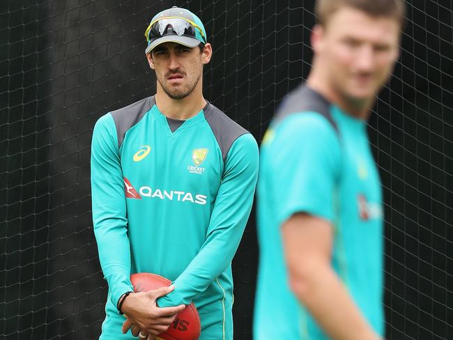 MELBOURNE, AUSTRALIA - DECEMBER 24: Mitchell Starc (L) ruled out with injury looks on as possible replacement Jackson Bird walk across during an Australian nets session at the  on December 24, 2017 in Melbourne, Australia.  (Photo by Michael Dodge/Getty Images)