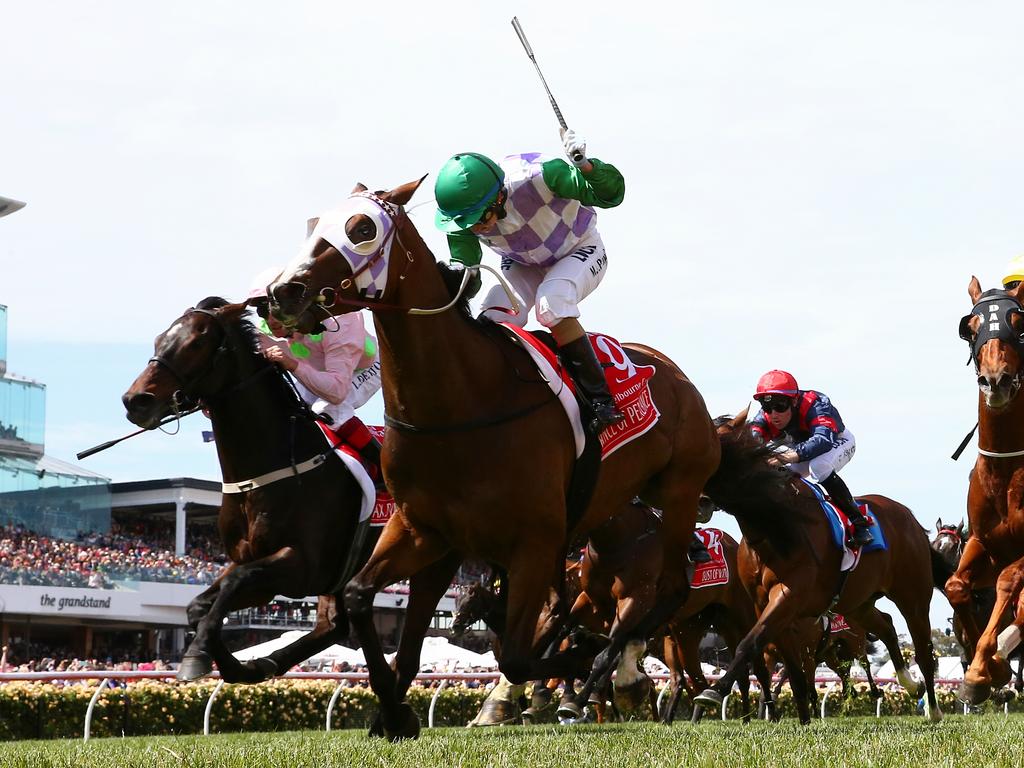 Michelle Payne winning the Melbourne Cup. Picture: George Salpigtidis