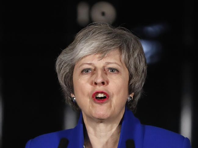 British Prime Minister Theresa May speaks outside 10 Downing street in London, Wednesday, Jan. 16, 2019. May's government survived a no-confidence vote Wednesday called after May's Brexit deal was overwhelmingly rejected by lawmakers. (AP Photo/Frank Augstein)