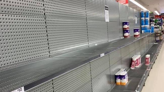 Woolworth in Medowie. Shelves stripped of toilet paper. Credit: Facebook