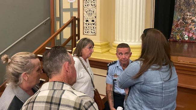 Inspector Paul Algie was mobbed by concerned locals after the meeting. Picture: Phillip Fynes-Clinton