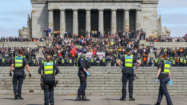 Protesters shout abuse at police and desecrate the hallowed ground of Melbourne’s Shrine of Remembrance that honours those who gave their lives for Australia in war. Picture: Getty Images