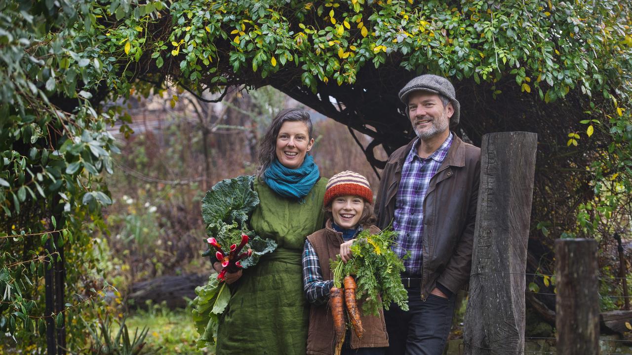 Kirsten and Nick with their 9yo son Ashar Fox and Nick Ritar with the veggies. Picture: Zoe Phillips