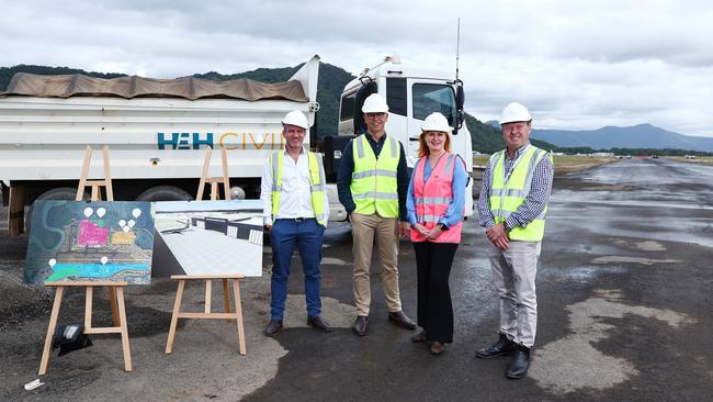 Construction on the Cairns Airport's eastern aviation precinct has begun, with initial earthmoving work underway at the site of the old runway, south of the domestic terminal. North Queensland Airports general manager of infrastructure and property Alan Dugan, chief executive Richard Barker, Advance Cairns chief executive Jacinta Reddan and Cairns Aviation Skills Centre business manager Chris Piggott inspect the site of the new precinct, which will house purpose-built infrastructure and facilities, and expand the airport's general aviation footprint. Picture: Brendan Radke