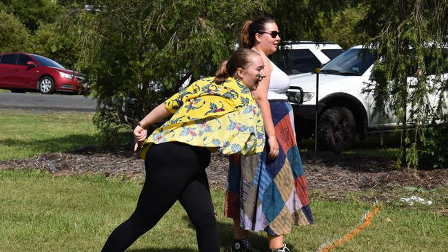 Montanna and Mikayla Faber having a go at the thong throw competition.