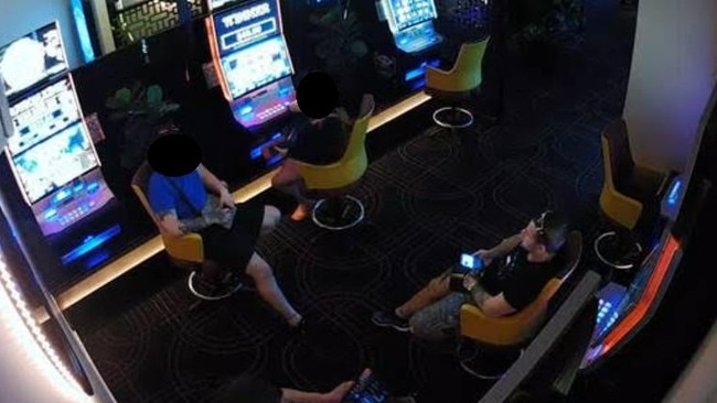 Dylan Gee (bottom right with black shirt) during a conversation in the poker machine room of the Rutherford Hotel before the shooting. Picture: NSW Police.