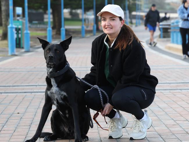 The Daily Telegraph 31.7.2024. Anna Ryder with her dog Luigi at Coogee beach. Talking about interest rate on her mortgage.  Picture: Rohan Kelly