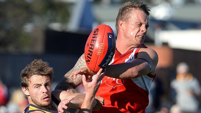 Jarrod King crashes a marking contest during the 2015 NFL Division 2 grand final. Picture: Josie Hayden.