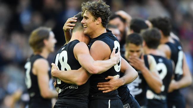 Charlie Curnow (right) and David Cuningham of the Blues react after the Round 12 AFL match between the Carlton Blues and the Brisbane Lions at Marvel Satdium in Melbourne, Saturday, June 8, 2019. (AAP Image/Julian Smith) NO ARCHIVING, EDITORIAL USE ONLY