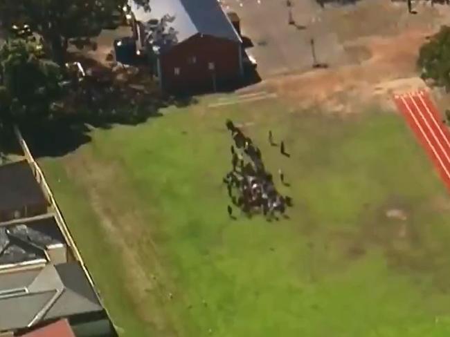 The Scene outside Banksia road Public school in Greenacre where a car has crashed through a classroom. Picture: Nine News