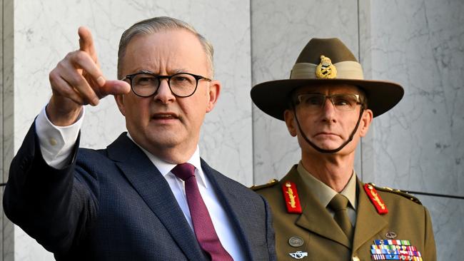 Australian Prime Minister Anthony Albanese and Chief of the Australian Defence Force Angus Campbell speak to the media after the release of the Defence Strategic Review at Parliament House.