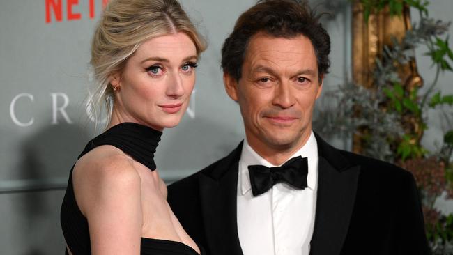 Debicki with co-star Dominic West, who plays Charles. Picture: Daniel Leal/AFP