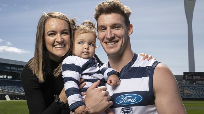 Josh Jenkins dons the Cats’ gear for the first time with his beautiful family, wife Hannah and daughter Lottie. Picture: Getty Images