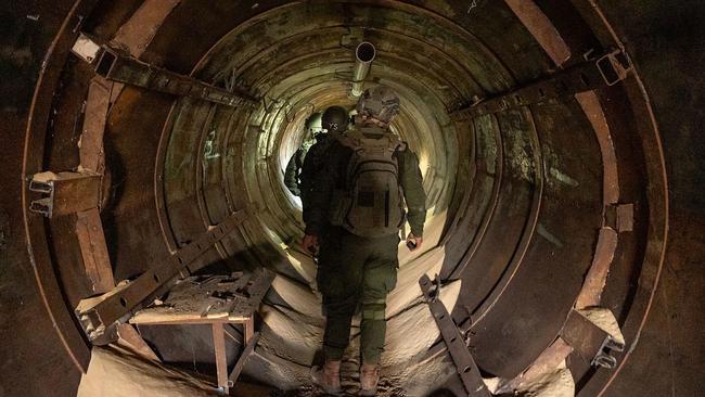 Israeli troops in the Hamas tunnel in Khan Younis. Picture: AFP