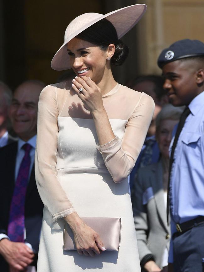 Meghan, the Duchess of Sussex laughs during her first royal engagement since her wedding to Prince Harry. Picture: Dominic Lipinski/Pool Photo via AP