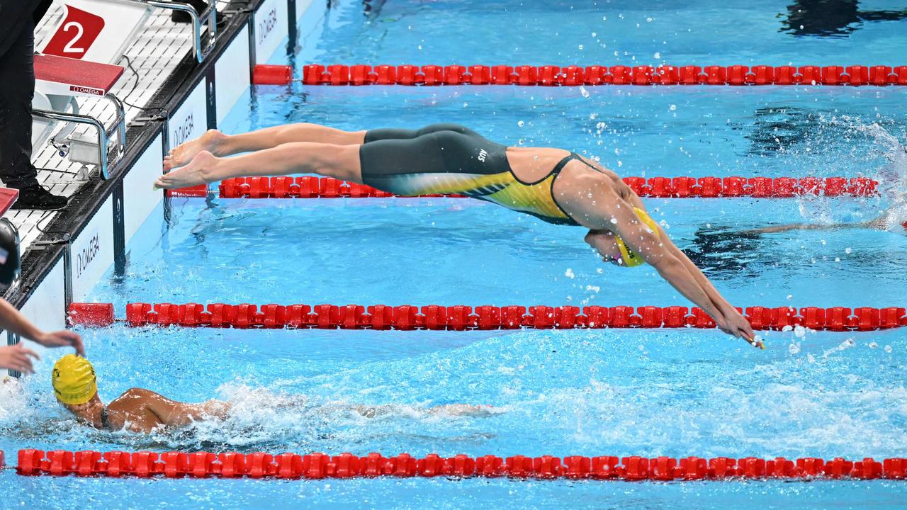 Looking good, Arnie: Titmus enters the water for her split in the 4x200m women’s final. Picture: Jonathan Nackstrand/AFP