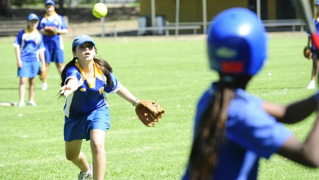 Claire Georgey in 2009 when she attended Merrylands Public School, pitches in the senior girls softball final against Parramatta West Public School. Picture: John Appleyard