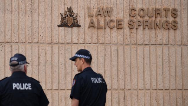 Police outside Alice Springs local court. Picture: Katie Hall