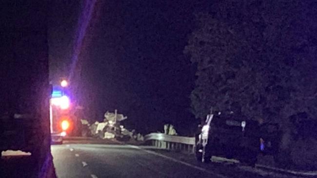 Emergency services at the scene of a horrific crash on the Bruce Highway near Mutarnee on Tuesday night. Picture: Craig Warhurst.