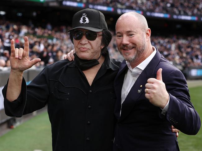 Luke Sayers with Kiss rocker Gene Simmons at the MCG. Picture: Michael Klein