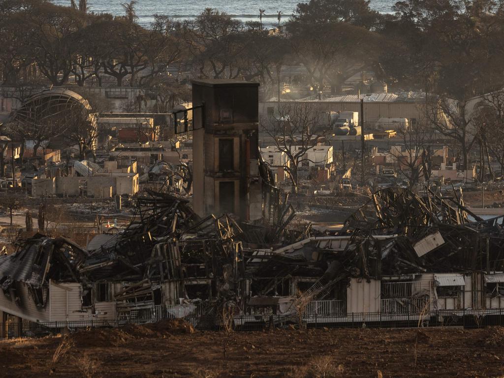 Burned houses and buildings are pictured in the aftermath of a wildfire, is seen in Lahaina, western Maui, Hawaii. Picture: AFP