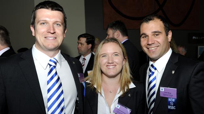 Aaron Warburton (left), along with Kate Hutchison and Frank Micali during his previous time at the Bulldogs in 2013.