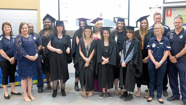 BOOYAH GRADS: Charlie Jenson (CQU), Sam Cowie (Education QLD), Randall Warkill (Police Liaison Officer), Latajah Von-Sendon , Antoinette Theideke, Jamilla Ahern, Kyna Tynan, Crystal Hogarth, Shelby Kiernan, Alexis Henderson, Vanessa Morrison, Mikayla Nolan, Bill Cullen (Youth Support Officer), Clare Warrington (Youth Support Officer) and Joe Ramsay (Coordinator). Picture: Jann Houley