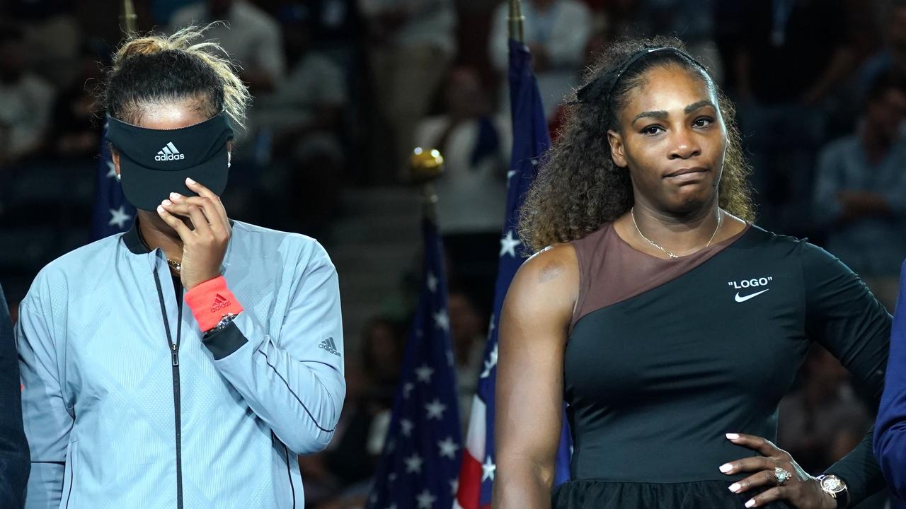 Osaka (left) after winning her first Grand Slam singles title at the 2018 US Open. (Photo by TIMOTHY A. CLARY / AFP)