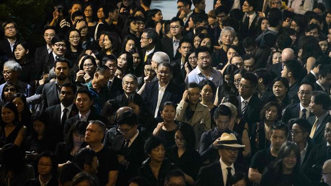 Lawyers and law students take part in a silent march in protest at a ruling by China which effectively bars two pro-independence legislators from taking office in Hong Kong. Picture: Anthony Wallace/AFP Photo