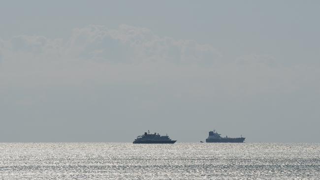 Cruise Ship Caledonia Sky (left) could be in Dariwin Harbour for the forseeable future. Picture: Pema Tamang Pakhrin