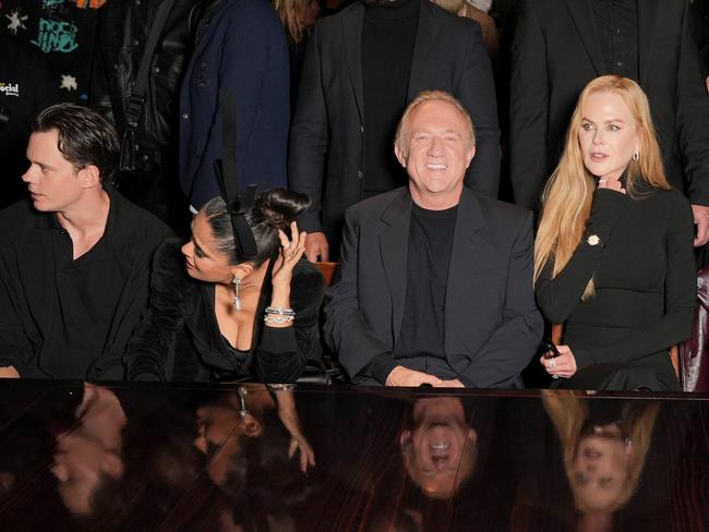 Bill Skarsgård, Salma Hayek, François-Henri Pinault and Nicole Kidman at the Balenciaga show. Picture: Swan Gallet/WWD via Getty Images