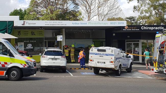 Emergency services at the scene where a woman, 86, accidently drove her car through the front window of Arthur St Physiotherapy at Forestville on Monday morning. Picture: Facebook