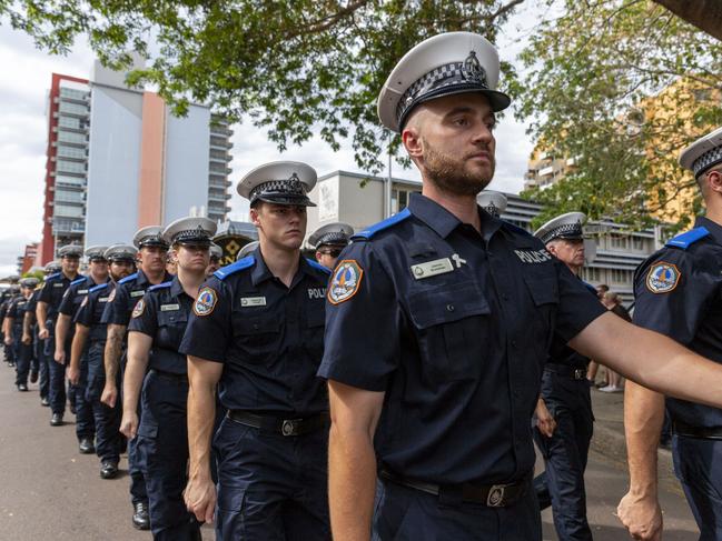 Police recruits during the march from Darwin Police Station. Picture: Floss Adams.