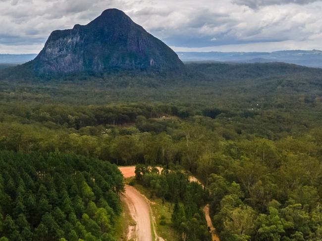 SUNSHINE COAST DAILY READER'S PIC: A drive past the Glass House Mountains was enough for Melbourne man Jeff Bee and his wife Carole to decide to stay for longer. The pair booked a beautiful B&B to enjoy the region over three days last October. "Maleny and Montville were highlights but photographing the various mountains was fantastic," Mr Bee says. The photographer says his favourite type of photography was drone shots. "We had lovely moody skies of the three days as this photo shows," he says. Picture: Jeff Bee